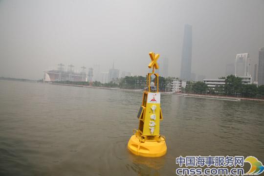 海事绿色环保航标标上亚运徽（图）