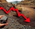 Iron ore drops, stays below $100/tonne as glut weighs
