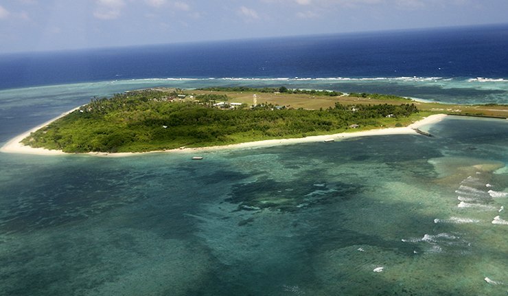 中国在南沙永暑礁建人工岛 投资相当于核航母