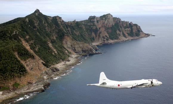 China says Japan fighter jets shadowed its planes over disputed waters