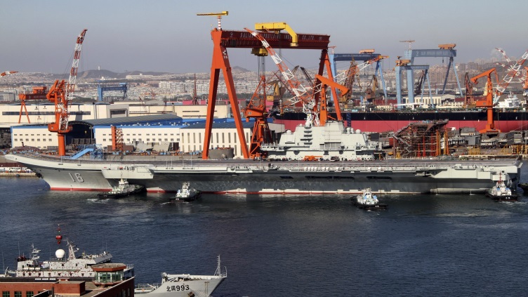 China tightens port inspections to curb Ebola