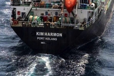 Product tanker recovered from hijackers, shadowed by naval ships
