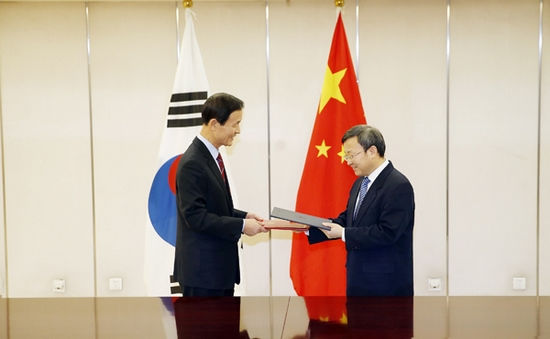 商务部：中韩、中澳自贸协定12月20日同时生效