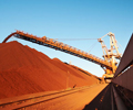 Iron Ore Surges Toward $60 as Steel `Exuberance’ Bolsters Buying